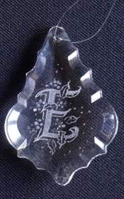 Crystal leaf pendant engraved with 'E'